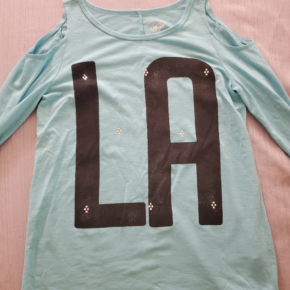 Light blue girl's printed shirt